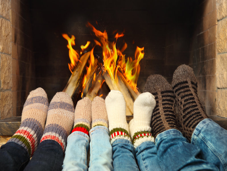 A family staying warm during a heater repair.