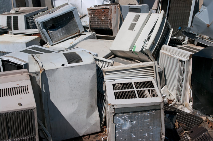 A scrap pile of window AC units.